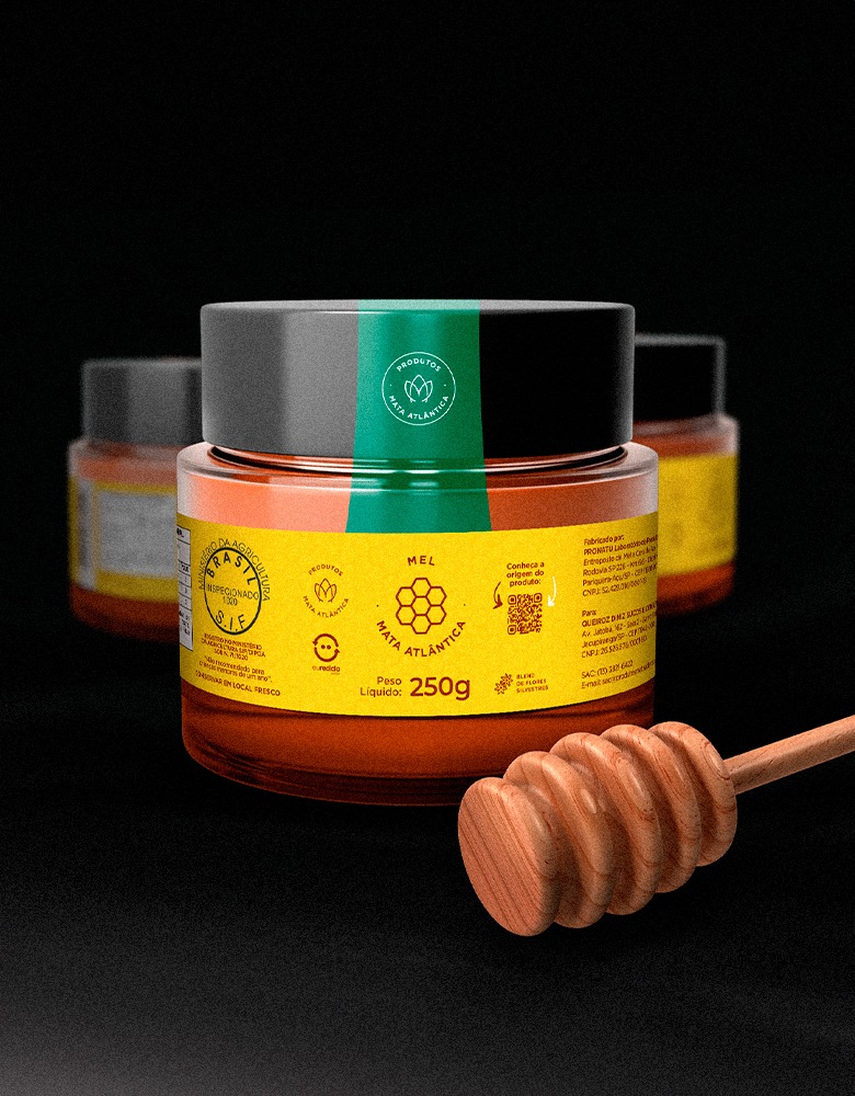 Pote de mel com rótulo amarelo da marca Mel Mata Atlântica